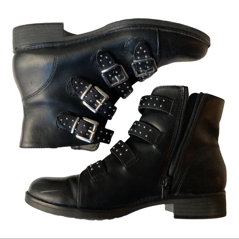 Black Steve Madden boots with fun buckles